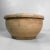 This robust earthenware bowl from Japan dates back to the Meiji period (1868–1912) and belongs to the mingei tradition,...