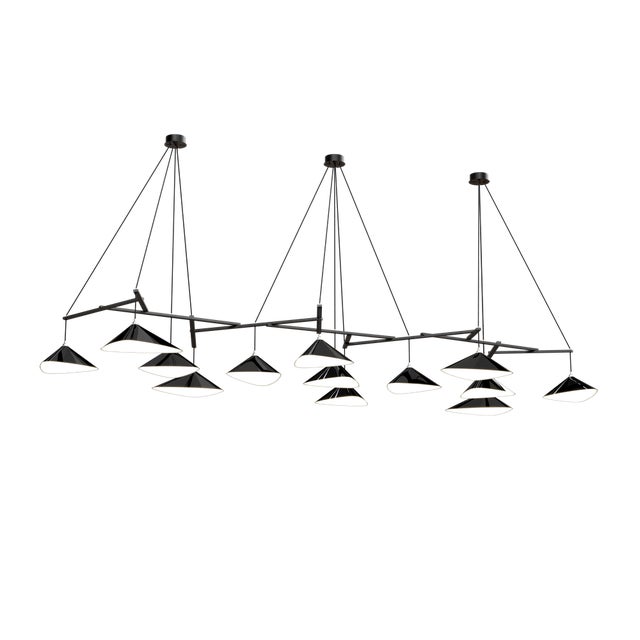 Emily is a series of handmade sheet steel lampshades in various finishes and spatial arrangements. _ Emily was inspired by...