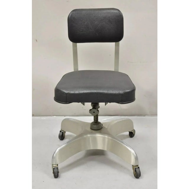 Vintage Emeco Corp Art Deco Brushed Aluminum Black Swivel Office Desk Chair. Details: Adjustable height, sculpted aluminum...