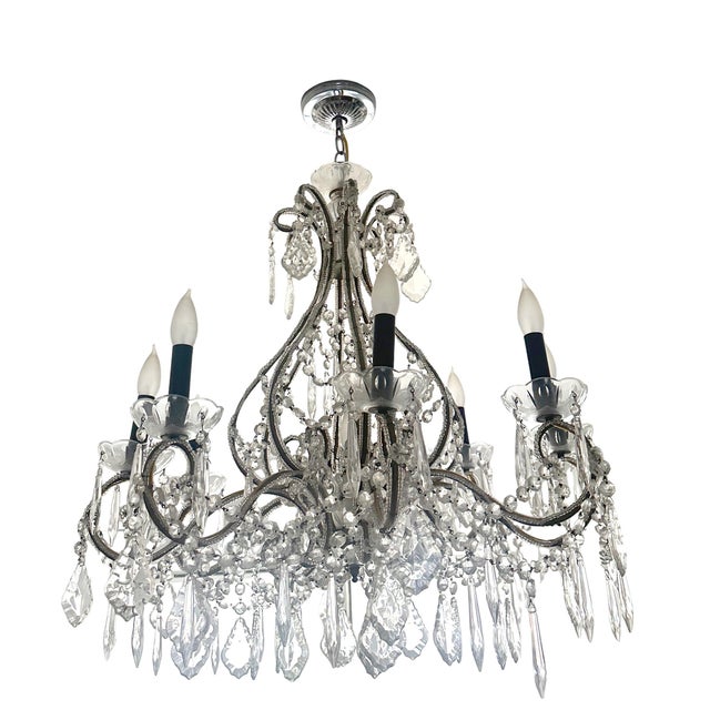 I purchased this chandelier in 2009 at a shop in Soho, NYC, that had vintage items. Sadly, the shop is no longer there. I...