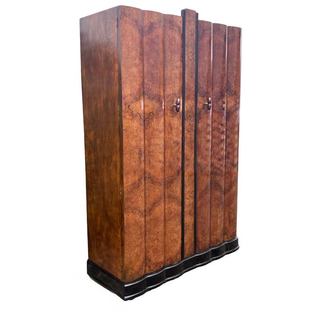 Gorgeous Art Deco Double wardrobe dating to 1930. This truly wonderful wardrobe boasts honey coloured highly figured burr...