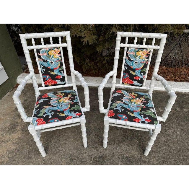 Pair of White Faux Bamboo Chairs. Fun boho chic beachy coastal chairs with dragon print fabric. Nice thick cotton blend....