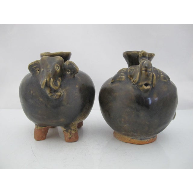Pair of Cambodian Khmer stoneware lime pots. Historically, these ceramic vessels were used to store lime, which is an...