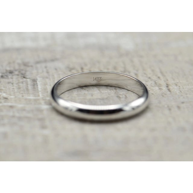 Ladies Classic 14K White Gold Wedding Band. This ladies band is crafted in a high polished 14 karat white gold and...
