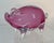 Handcrafted clear and pink glass figurine of an adorable pig. Artist signature on the belly.