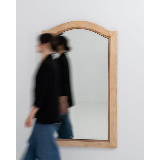 This piece presents as a mirror, distinguished by natural bleached oak frame, arched top. The piece dates to 1900s,...