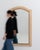 This piece presents as a mirror, distinguished by natural bleached oak frame, arched top. The piece dates to 1900s,...