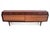 Teak sideboard, manufactured in Denmark in the 1960s. The furniture has four external drawers. Behind a pair of sliding...