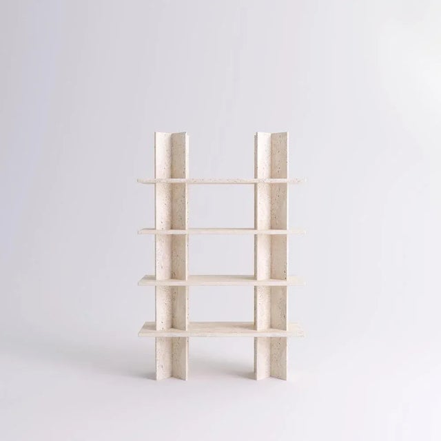 Monument travertine shelves by mathieu girard & gauthier pouillart dimensions: l 130 x h 117 materials: white travertine...