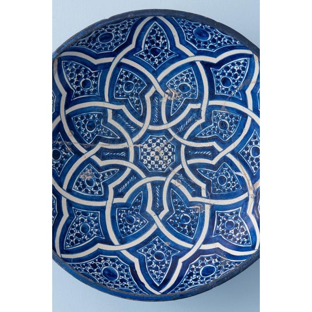Diameter: 39 cm Height: 9 cm Historical restoration to body. Some wear and repairs to glaze, commensurate with age. Two...