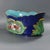 A Minton majolica jardinière with a mythological theme, decorated in the firm’s blue ground colourway and richly modelled...