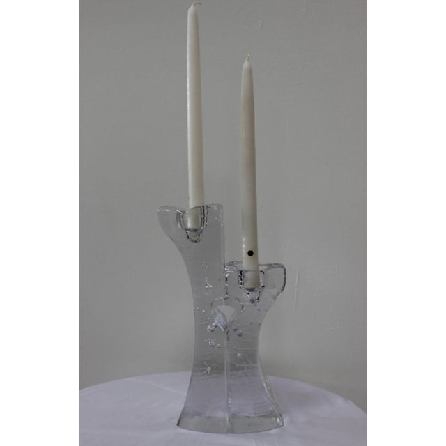 1970s modern glass candle holders by Kosta Boda. Small candle holder width 3'' depth 3.5'' height 8.5''.