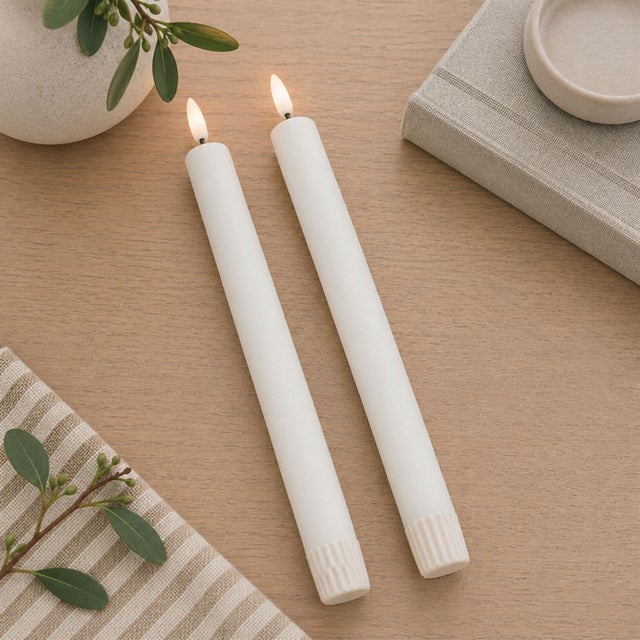 Add elegance and safety to your home with the FIA Wick White Taper Candles. Featuring FIA Wick technology, these candles...