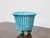 With its bright turquoise glaze and eye-catching texture, this Spanish midcentury porcelain basket adds a striking pop of...