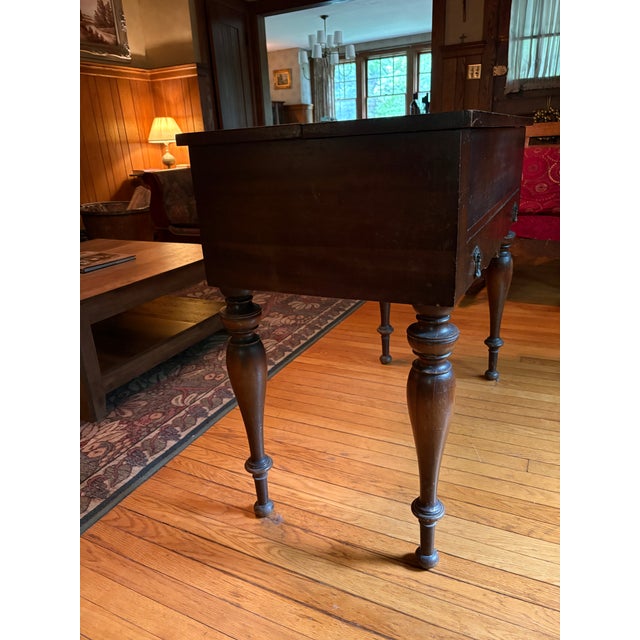 This beautiful antique spinet desk is a perfect blend of historical charm and functional design. The "flip-top" or sliding...