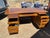The Alma Co Vintage Mid Century Modern Fan Walnut Executive Desk is a stunning piece of antique furniture from the 1960s....