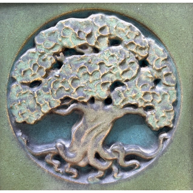 Here we have a hard to find Original Rookwood Tree of Life plaque , good incised decoration and matte greens and blues ,...