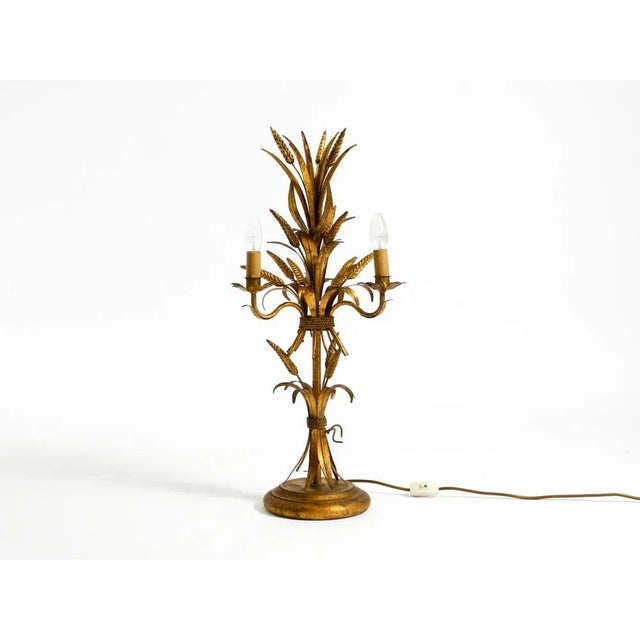 Beautiful 1970s gilded Florentine Regency "Sheaf of Wheat" table lamp. This lamp is an original from an earlier...