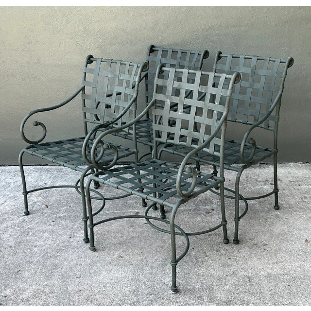 Crafted by famed outdoor furniture manufacturer Brown Jordan, this set of four "Florentine" collection dining armchairs...
