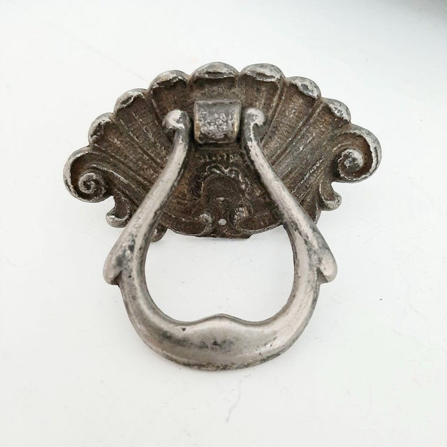 This pair of antique Victorian French knobs have an ornate shell design and can be used on a dresser or cabinet door, as a...