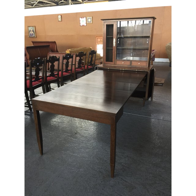 Mid century modern dining table made by Extensole . This is amazing , the table pulls out to 8 feet. It has 6 leaves. When...