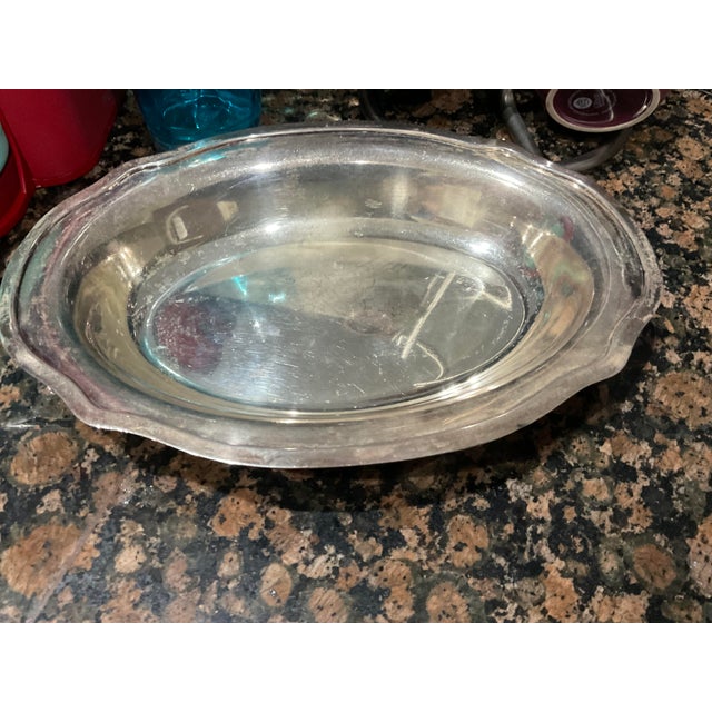 A handsome and substantial Gorham sterling silver oval serving dish, pattern/model #13565, displaying the quality of...