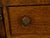 An English georgian period oak dresser from the 18th century with open shelves, six drawers, two doors and bone-inlaid...
