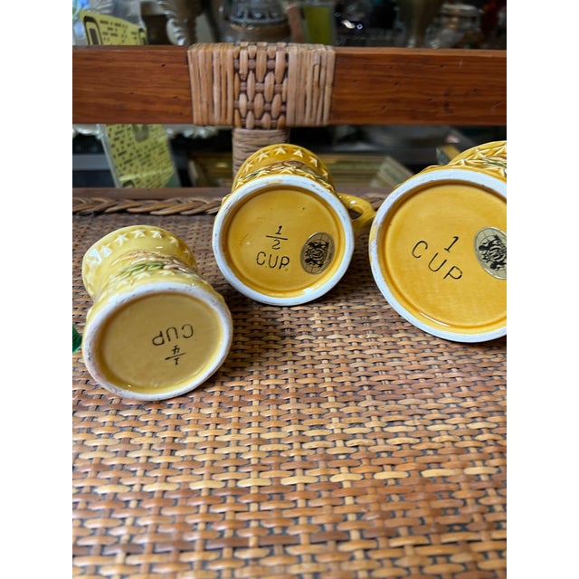 Up for consideration is a beautiful vintage set of Americana ceramic measuring cups with eagle accents. These would look...