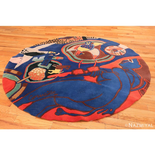 Vintage Round Corneille Rug, Scandinavia, circa Mid-Twentieth Century This vintage, graphic rug features a composition by...