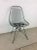 This mid century modern accent chair by Eames for Herman Miller features wire seat with original black paint and signature...