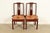 An outstanding pair of antique Chinese side chairs or dining chairs China, Circa 1890s Gorgeous carved rosewood, with...