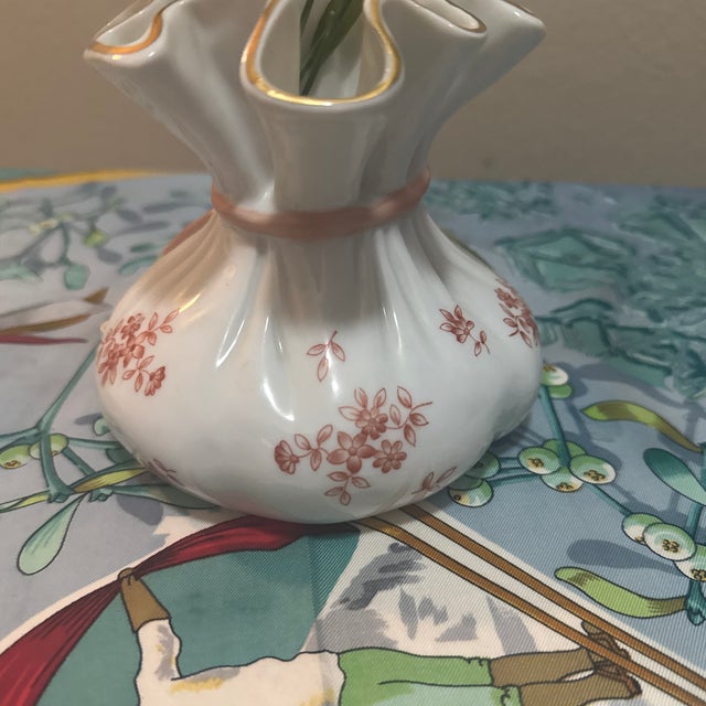 Add a touch of cottagecore charm to your home with this beautiful porcelain bud vase. Its whimsical design mimics a...