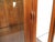 Wood Mid Century Tall Walnut Curio Display Cabinet in the Style of Danish Modern For Sale - Image 7 of 18