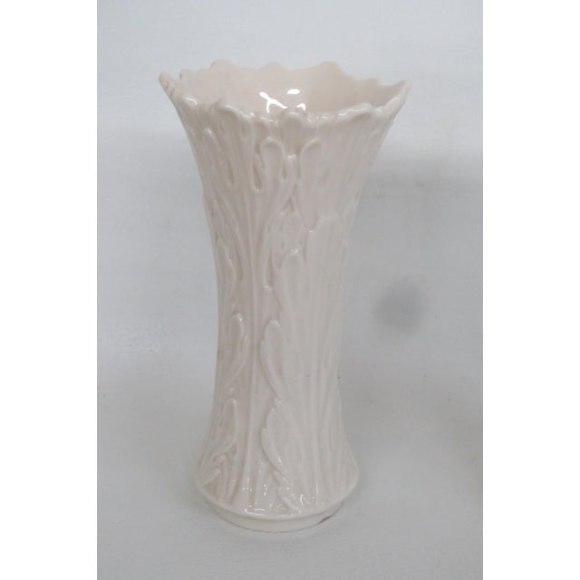 This gorgeous Pair of 2 Vases are made of porcelain. These lovely vases are stamped on the bottom as being made in the USA...