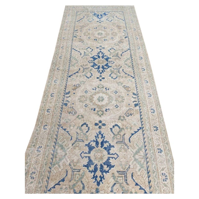 Exact Size: 4'4" x 10'8" Color: Natural Age: Old Materials: Wool Construction: Hand Knotted Origin: Iran