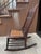 Early 20th/Late 19th Century Victorian Rocking Chair With Spindle Back and Cane Seat For Sale - Image 4 of 12