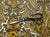 51" W British cotton Tunis paisley drapery fabric in green, brown, white, and mustard yellow. Price is per yard. Pattern...