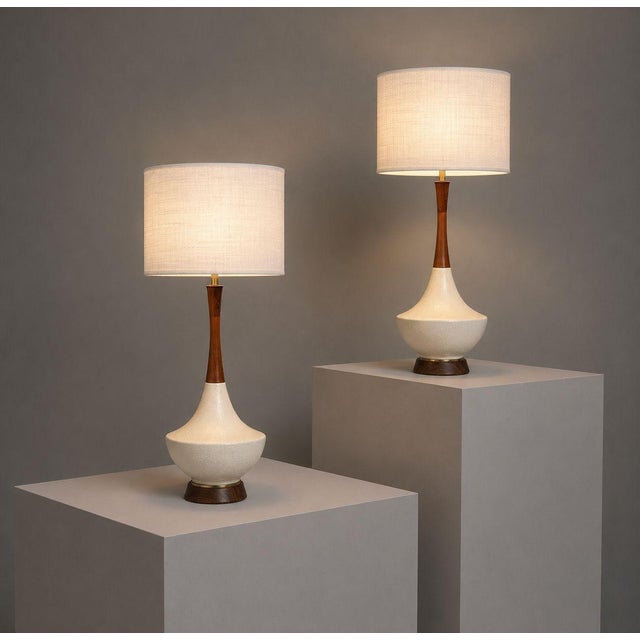 American Mid-Century Modern, Large Table Lamps, White Porcelain, Walnut, Brass, USA, 1950s Pair of captivating modernist...