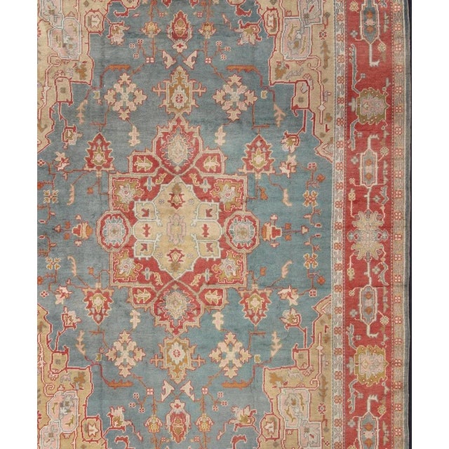 Antique Turkish Oushak Rug on a Blue Background and Orange-Red Color Border For Sale - Image 4 of 12