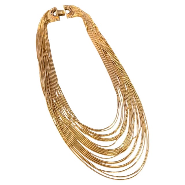 This exquisite multi-strand necklace from the 2010s is a testament to the bold artistry of Italian costume jewelry,...
