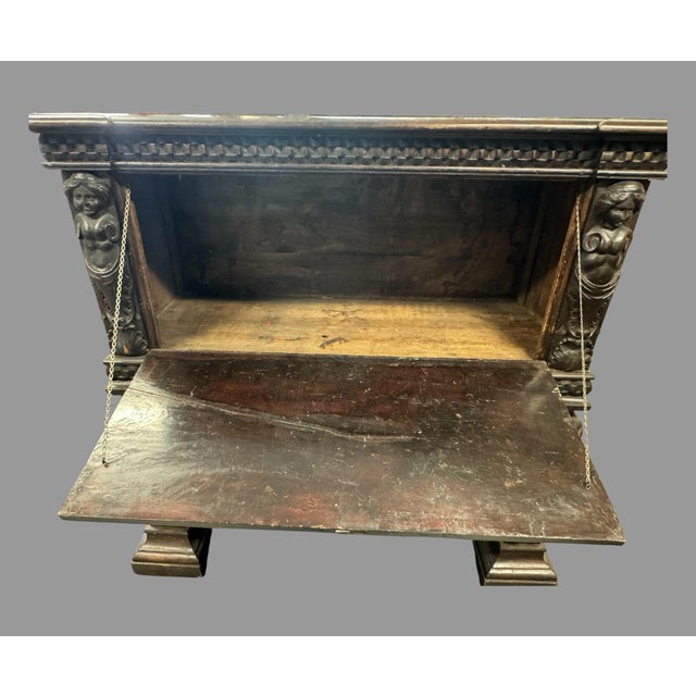 Antique Carved Oak Drop Front Desk Renaissance Revival Figural Lion Writing Desk Offered for sale is a stunning antique...