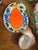 Up for consideration is a beautiful vintage pair of orange and blue plates and teacups. These would look lovely in your...
