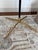 AERIN Frankfort floor lamp (model ARN1001) by Visual Comfort & Co: black stem with antique brass accents, X-base, and a...