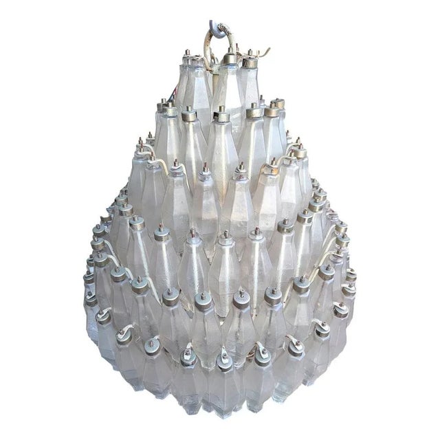 Imposing chandelier from Venini, design by Carlo Scarpa, circa 1950, composed of 205 white transparent glass and 19 lamp...