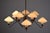 An elegant 1950s Italian chandelier by Lumen, featuring a refined 10-light design. The brass structure features sinuous,...