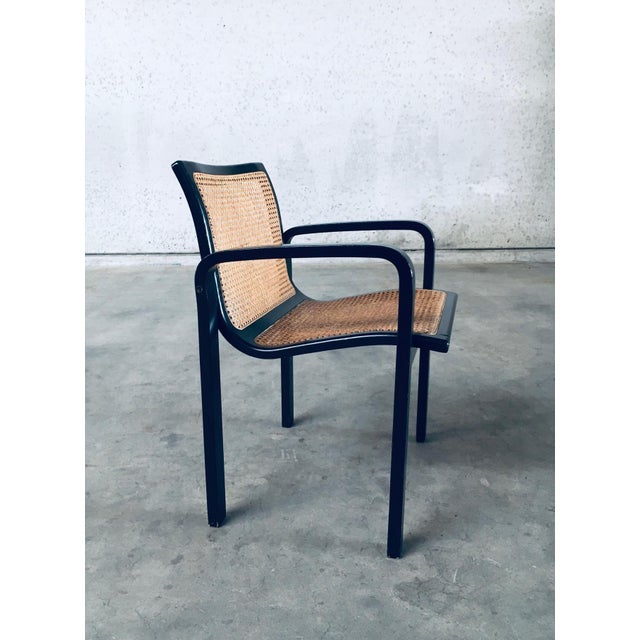 Vintage Midcentury Modern Design Bentwood and Webbing Armchair. Made in Italy, 1970's period. Black painted bentwood frame...