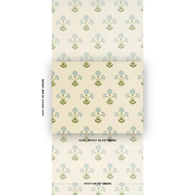Inspired by traditional Indian hand-block designs, sky-colored Saranda Flower Sisal wallpaper features stylized flowers...