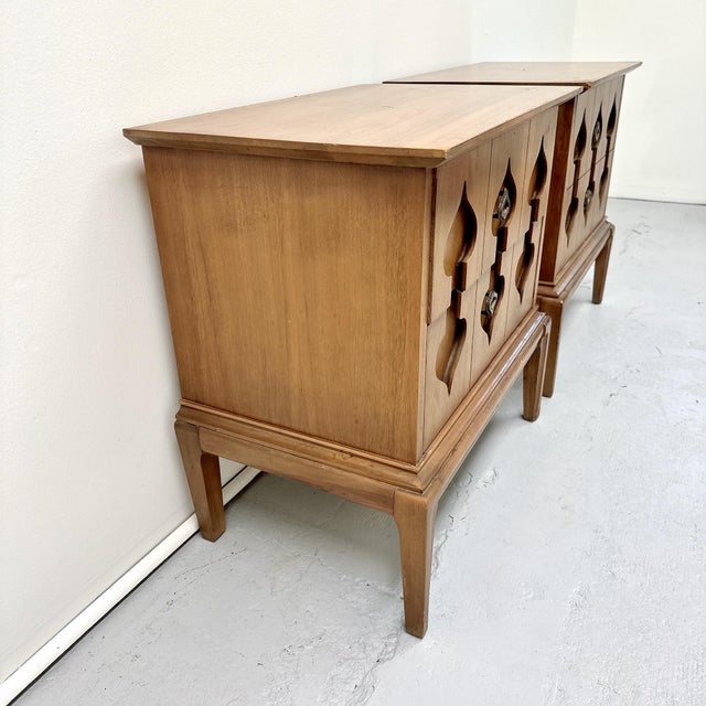 Pair of Mid-Century Modern Nightstands. Appears to be Kent Coffey Perspecta. Wood composition may be walnut. Item is...