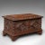 This is a small antique apprentice-piece chest. An Anglo-Indian, carved teak Colonial keepsake box, dating to the late...
