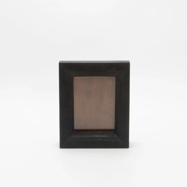 This 5x7” picture frame by R&Y Augousti epitomizes timeless elegance with its luxurious use of black shagreen, lending a...